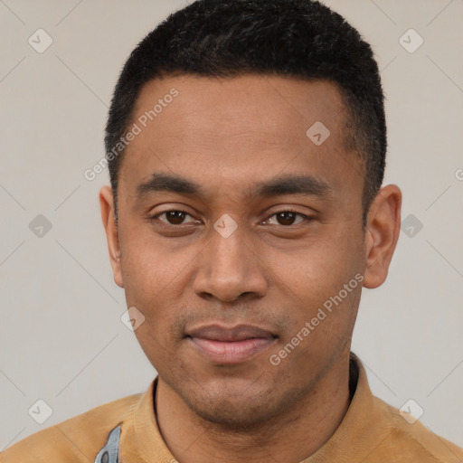 Joyful latino young-adult male with short  black hair and brown eyes