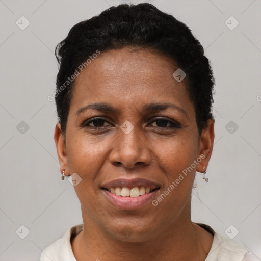 Joyful latino young-adult female with short  black hair and brown eyes