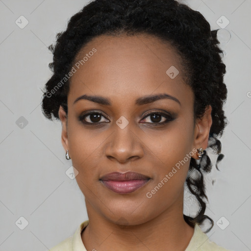 Joyful black young-adult female with long  black hair and brown eyes