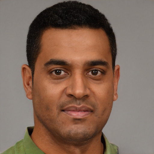 Neutral black young-adult male with short  brown hair and brown eyes