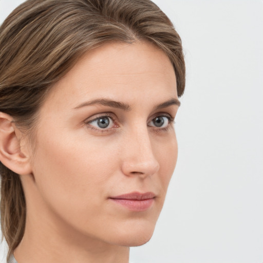 Neutral white young-adult female with medium  brown hair and grey eyes