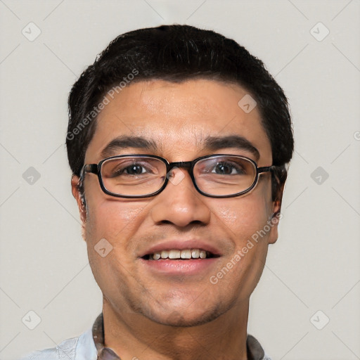 Joyful white young-adult male with short  black hair and brown eyes