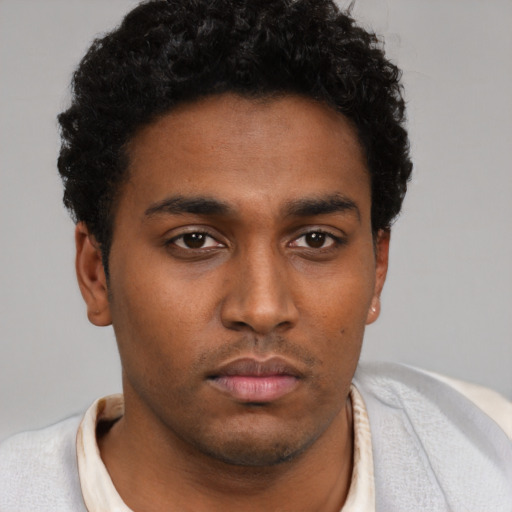 Neutral black young-adult male with short  brown hair and brown eyes