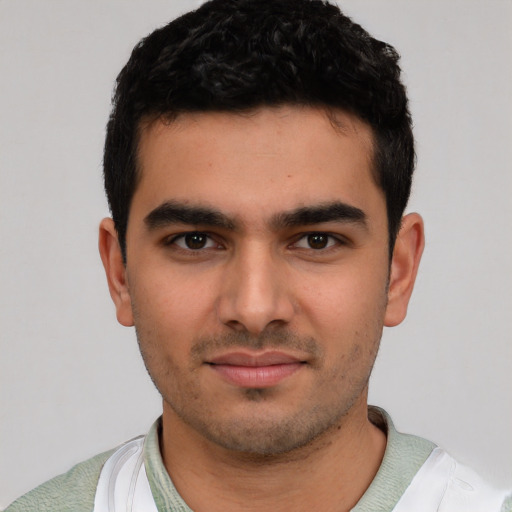 Neutral white young-adult male with short  black hair and brown eyes