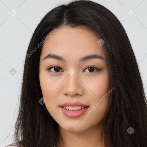 Joyful asian young-adult female with long  brown hair and brown eyes