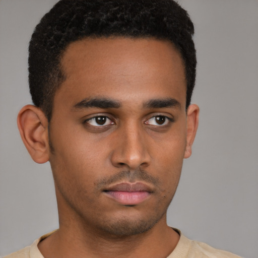 Neutral latino young-adult male with short  brown hair and brown eyes