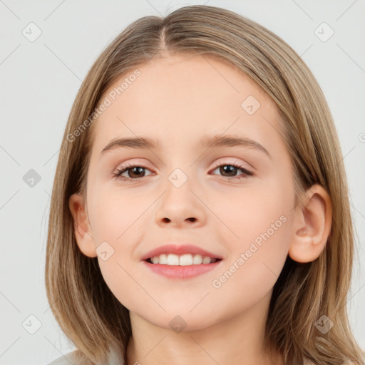 Joyful white child female with medium  brown hair and brown eyes