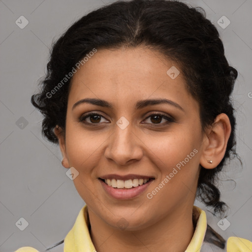 Joyful latino young-adult female with short  brown hair and brown eyes