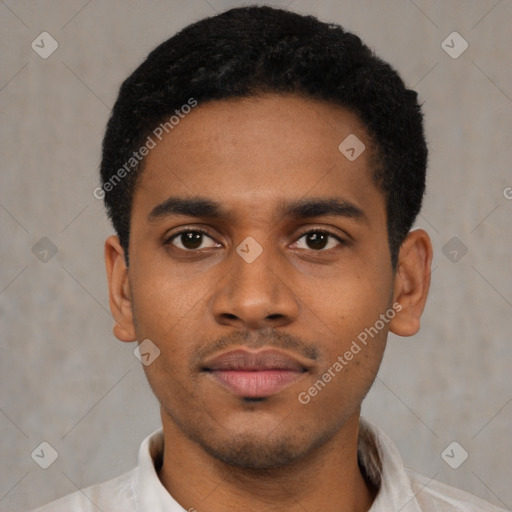 Neutral latino young-adult male with short  black hair and brown eyes