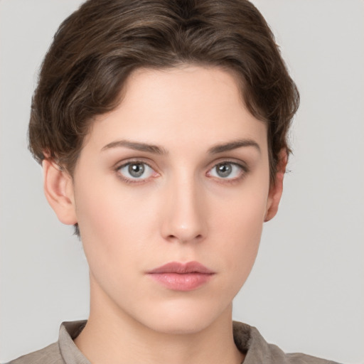 Neutral white young-adult female with short  brown hair and grey eyes