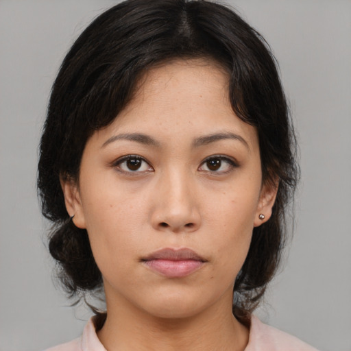 Neutral asian young-adult female with medium  brown hair and brown eyes