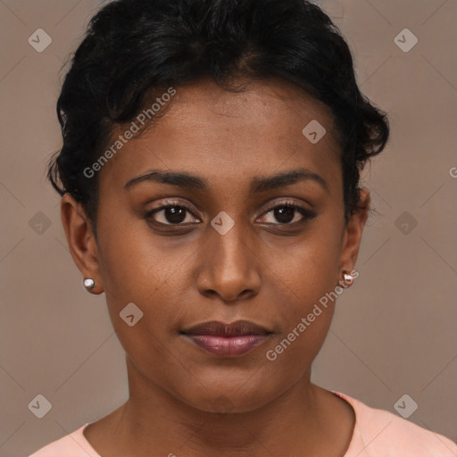 Joyful latino young-adult female with short  brown hair and brown eyes