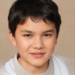 Joyful white child male with short  brown hair and brown eyes