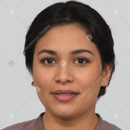 Joyful latino young-adult female with medium  black hair and brown eyes