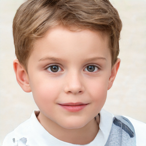 Joyful white child male with short  brown hair and grey eyes