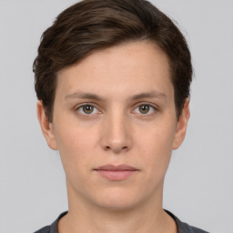 Neutral white young-adult female with short  brown hair and brown eyes