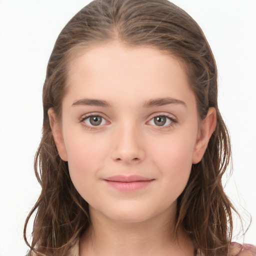 Joyful white child female with long  brown hair and brown eyes