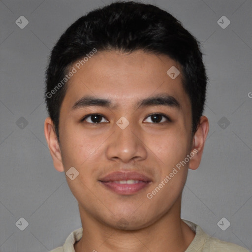 Joyful asian young-adult male with short  black hair and brown eyes