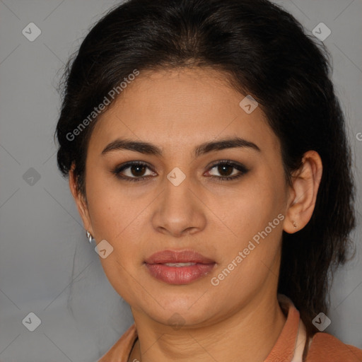 Joyful latino young-adult female with medium  brown hair and brown eyes