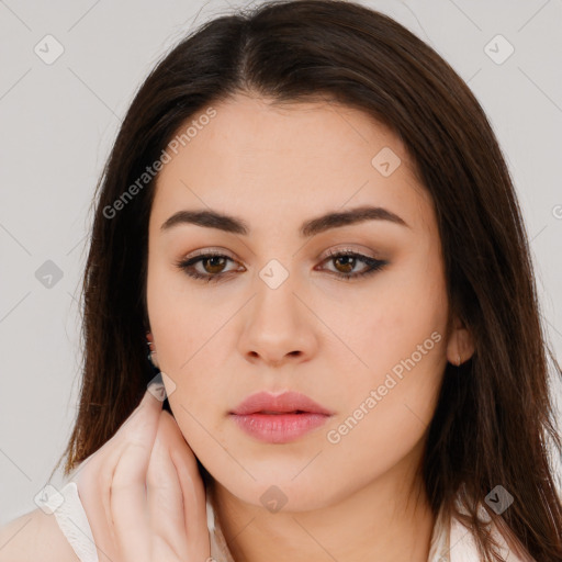 Neutral white young-adult female with long  brown hair and brown eyes