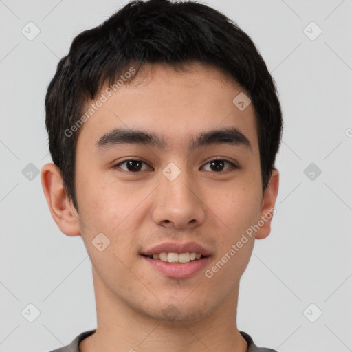 Joyful asian young-adult male with short  brown hair and brown eyes