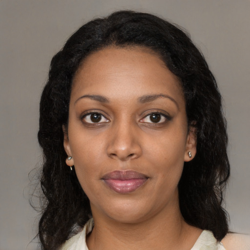 Neutral black young-adult female with long  black hair and brown eyes