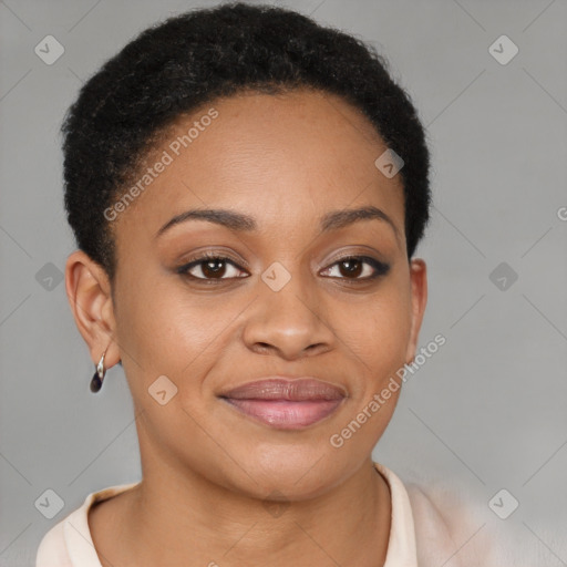 Joyful black young-adult female with short  brown hair and brown eyes