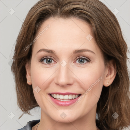 Joyful white young-adult female with medium  brown hair and grey eyes