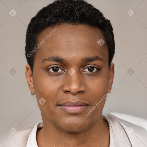 Joyful black young-adult male with short  black hair and brown eyes