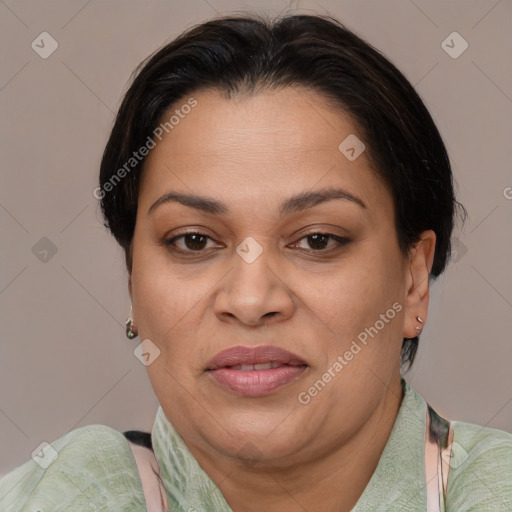 Joyful white adult female with medium  brown hair and brown eyes