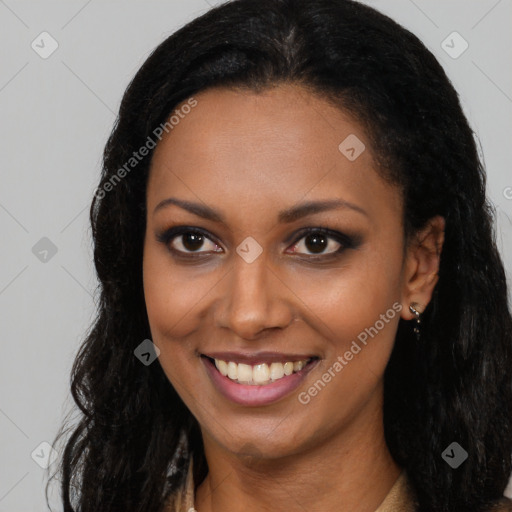 Joyful latino young-adult female with long  brown hair and brown eyes