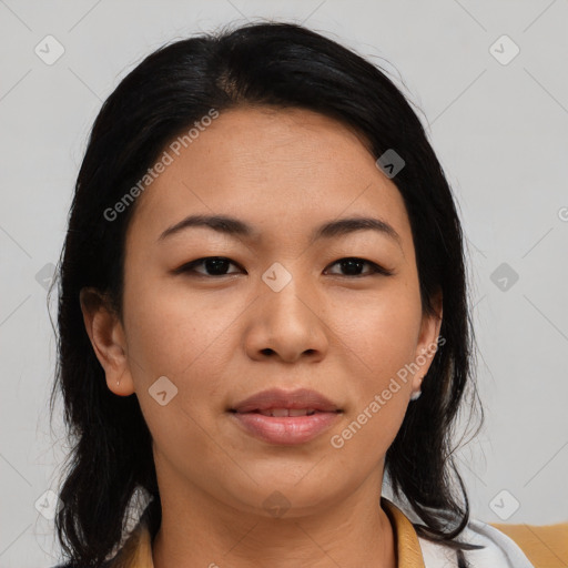 Joyful asian young-adult female with medium  black hair and brown eyes