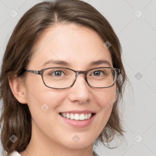 Joyful white young-adult female with medium  brown hair and green eyes