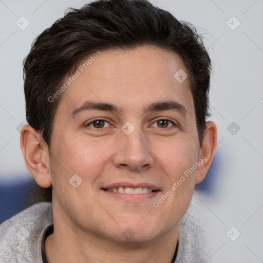 Joyful white adult male with short  brown hair and brown eyes