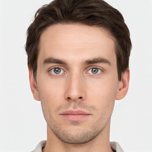 Neutral white young-adult male with short  brown hair and brown eyes