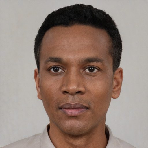 Neutral black young-adult male with short  black hair and brown eyes