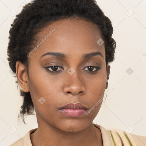 Neutral black young-adult female with long  brown hair and brown eyes