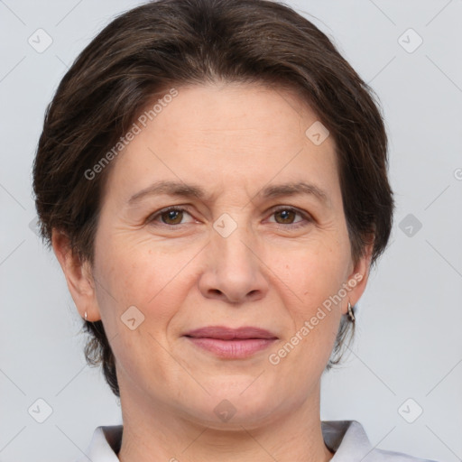 Joyful white adult female with short  brown hair and brown eyes