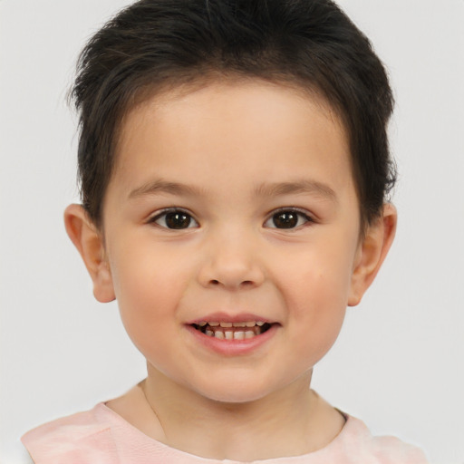 Joyful white child male with short  brown hair and brown eyes