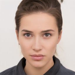 Neutral white young-adult female with short  brown hair and brown eyes