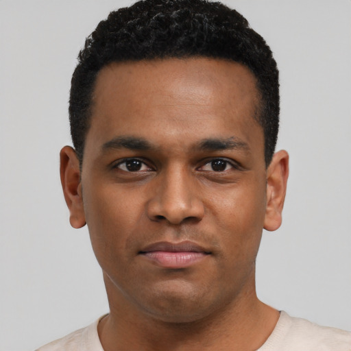 Neutral black young-adult male with short  black hair and brown eyes