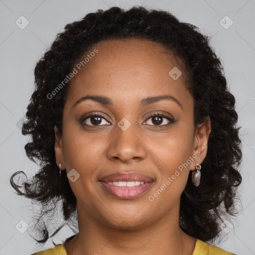 Joyful black young-adult female with medium  brown hair and brown eyes