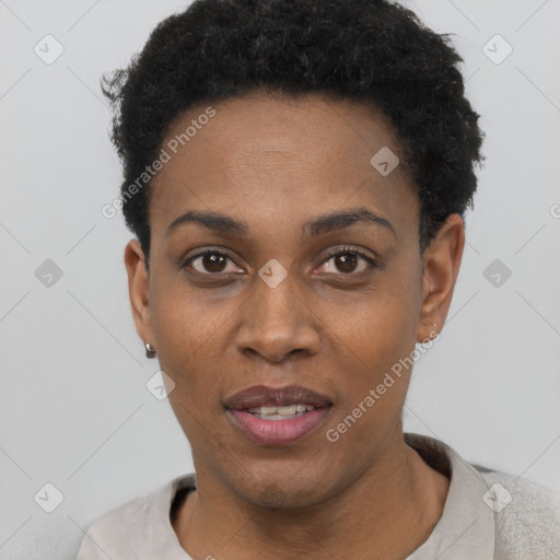 Joyful black young-adult female with short  black hair and brown eyes