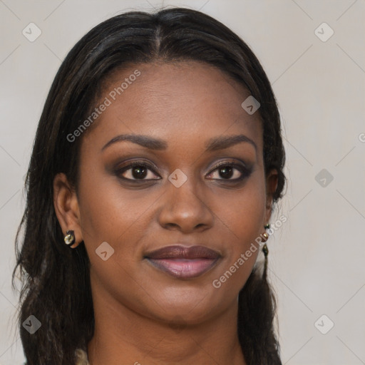 Joyful black young-adult female with long  brown hair and brown eyes