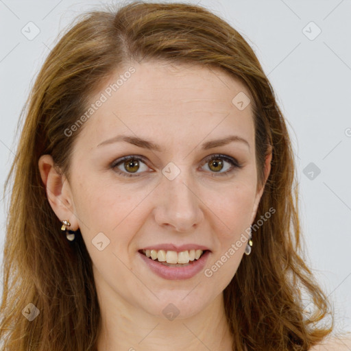 Joyful white young-adult female with long  brown hair and green eyes