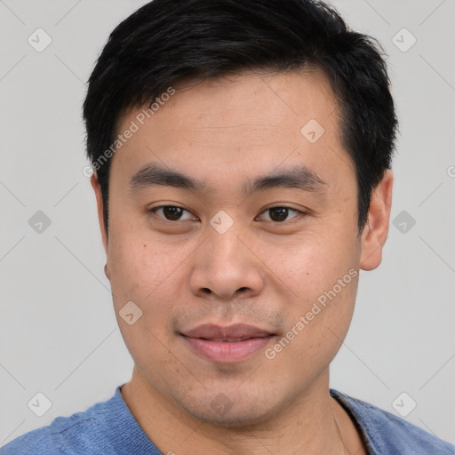 Joyful white young-adult male with short  black hair and brown eyes