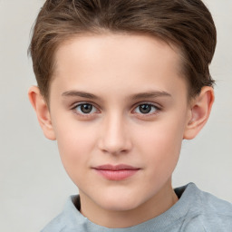 Joyful white child female with short  brown hair and brown eyes