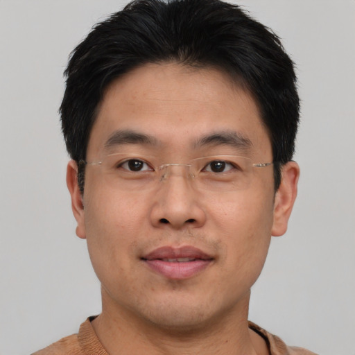 Neutral asian young-adult male with short  brown hair and brown eyes