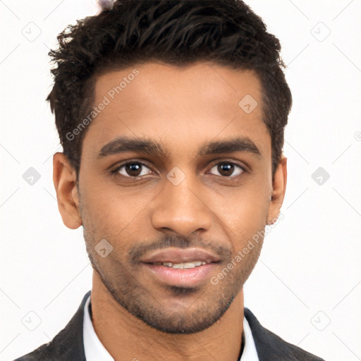 Joyful white young-adult male with short  black hair and brown eyes