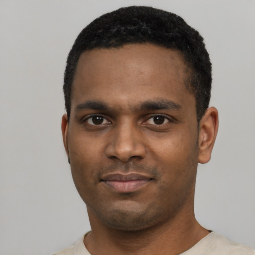 Neutral black young-adult male with short  black hair and brown eyes